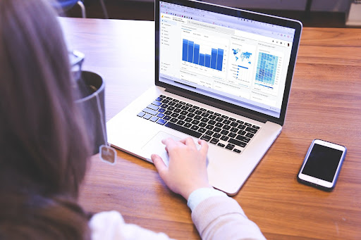 woman looking at laptop