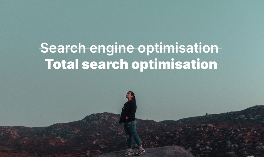 A woman standing in an outdoor environment under the headline "Total Search Optimisation".