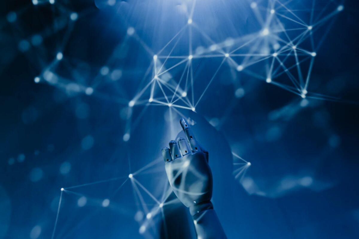 Image showing a robot hand touching neural networks