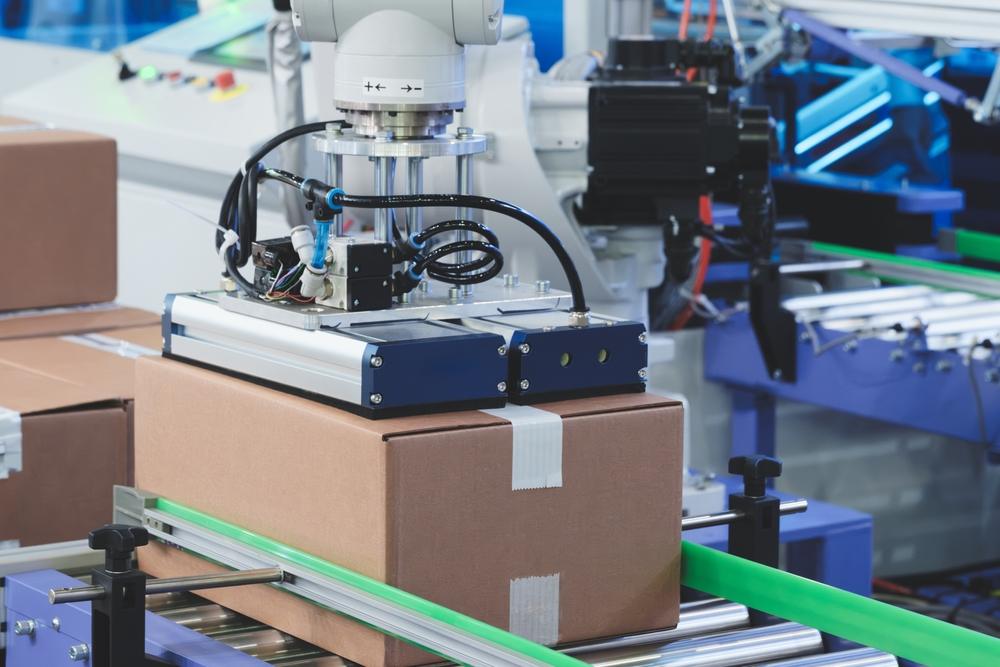 Robotic,Warehouse,Line,For,Packing,Orders,Into,Cardboard,Boxes,,Packaging